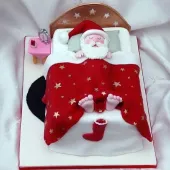 Новогодний торт "Дед Мороз в кроватке"